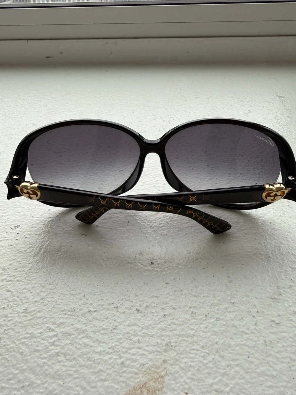 Gucci Black Oversized Oval Sunglasses with Heart Accent